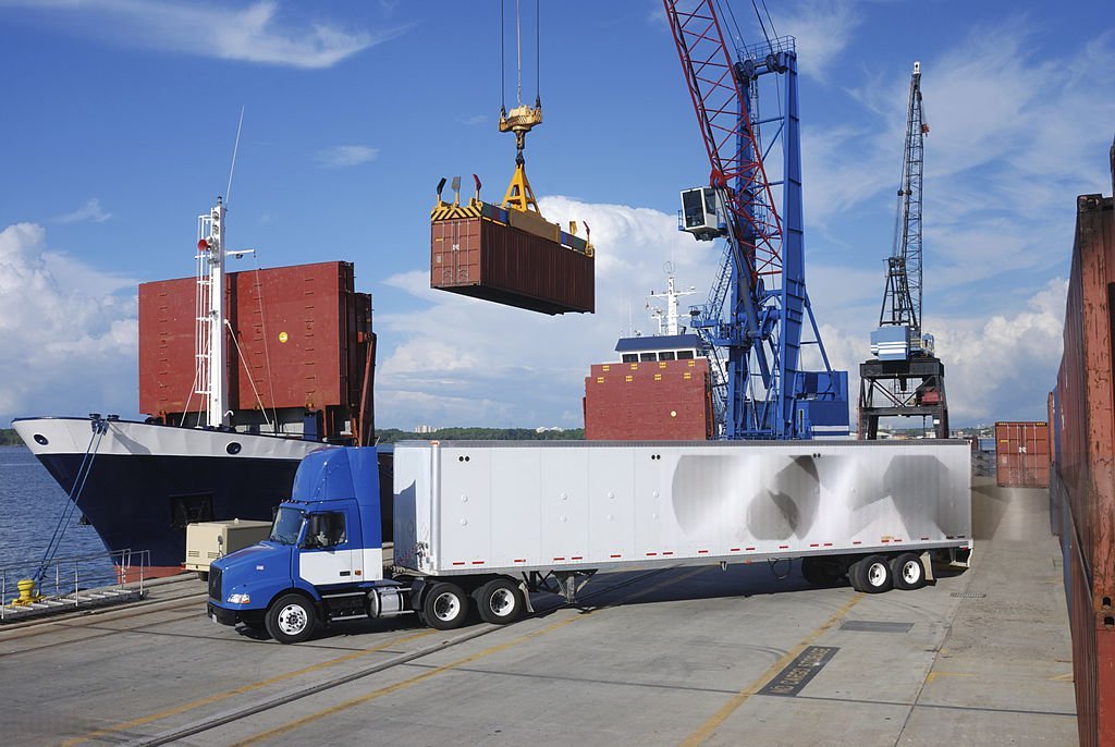 Rice containers being loaded for export at a Thai port
